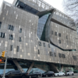 Cooper Union with cars parked on the side