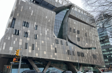 Cooper Union with cars parked on the side