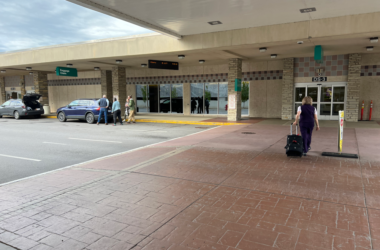 a group of people walking outside a building