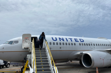 a woman standing on a plane