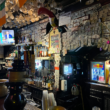 a bar with a toucan on the wall