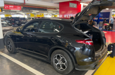 a black car with the trunk open