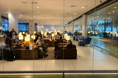 a group of people sitting in a lounge area