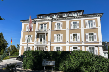 a building with a flag on the side