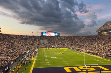 a large crowd of people on a football field