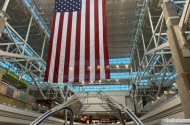 a large flag from the ceiling of a building