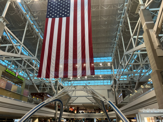 a large flag from the ceiling of a building