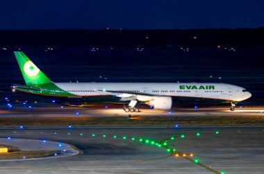 a plane on the runway at night