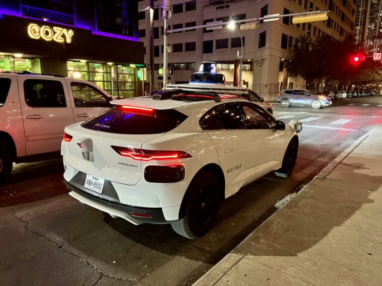 a white car parked on a street