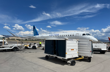 A United Express flight was forced to divert after what appears to be a small fire inside the window housing of the Embraer E175 aircraft.