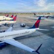 airplanes parked at an airport