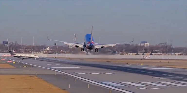 a plane taking off from a runway