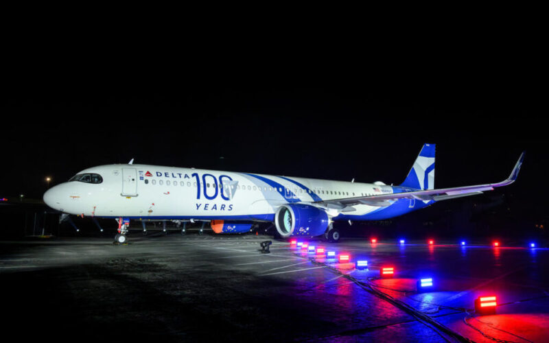 a plane on the runway at night