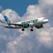 Frontier Airlines is launching an unlimited companion travel benefit for its elite flyers and gifting status to 100 people in the process.