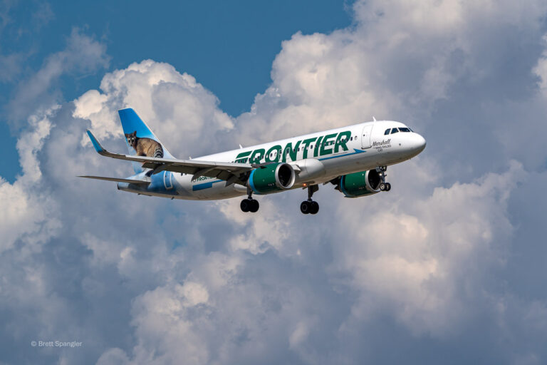 Frontier Airlines is launching an unlimited companion travel benefit for its elite flyers and gifting status to 100 people in the process.