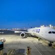 A group of United Airlines flight attendants crashed the carrier's new Polaris Business Class reveal to protest contract talks.