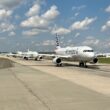 American Airlines is testing new technology during the busy summer travel season to assist passengers with connections at its hubs.