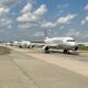 American Airlines is testing new technology during the busy summer travel season to assist passengers with connections at its hubs.