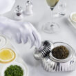 Emirates has made additional enhancements to First Class with white glove service in the air and a revamped check-in lounge in Dubai.