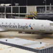 an airplane parked in a hangar