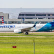 Delta Air Lines and Korean Air are purchasing a 25% stake in Canada's second largest airline, WestJet, for $550 million.