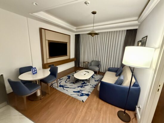 a room with a table and chairs