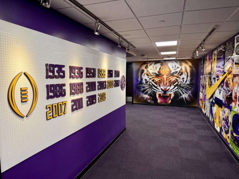a hallway with pictures of tigers and numbers