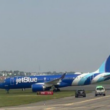 A JetBlue Airbus A220-300 slid off of the runway after landing at Boston Logan International Airport (BOS) earlier today.