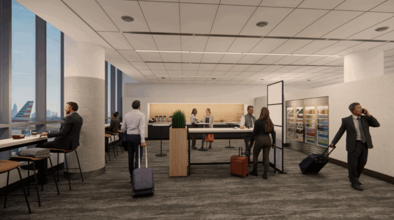 a group of people in a room with luggage