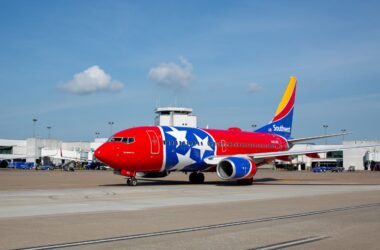 a red and blue airplane with stars on it
