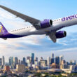 a plane flying over a city