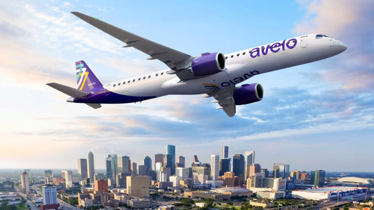 a plane flying over a city