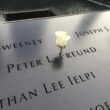 a white flower on a stone