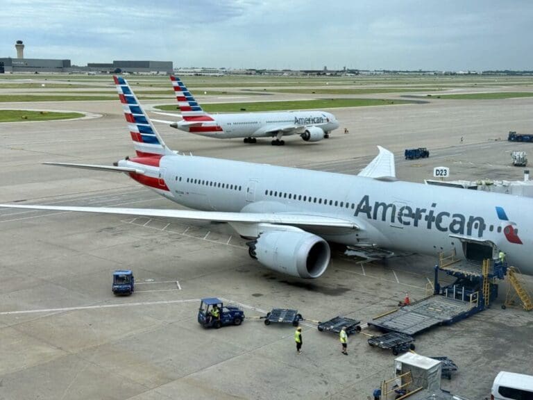 a group of airplanes on a runway