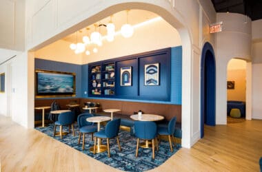 a room with tables and chairs