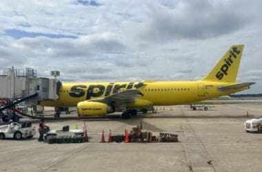 a yellow airplane on a tarmac