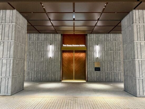 a building with a door and a sign