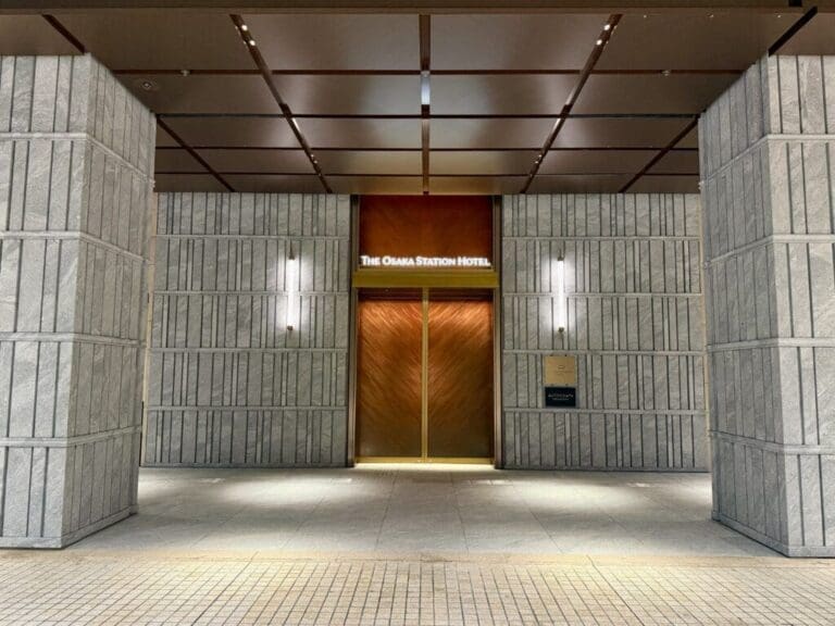 a building with a door and a sign